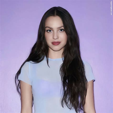 18-year-old pop star Olivia Rodrigo appears to show off her fully nude body in the recently released selfie photos above and below. There is no denying that Olivia Rodrigo is a tight little piece of ass that desperately needs her sex holes stretched open wide by a Muslim man’s enormous meat scud.